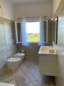 Ein Badezimmer in der Unterkunft Villa Oltremare