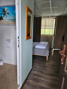 A bed or beds in a room at Orehite-Family Hotel ,Food & Pool