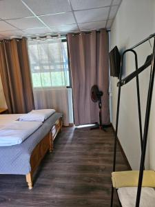 A bed or beds in a room at Orehite-Family Hotel ,Food & Pool