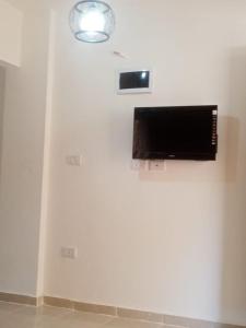 TV a/nebo společenská místnost v ubytování Shale ali
