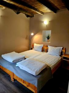 A bed or beds in a room at Orehite-Family Hotel ,Food & Pool