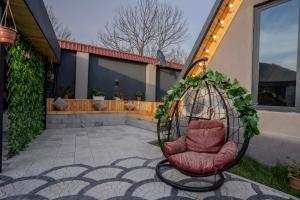 Posezení v ubytování Qafqaz Riveria Chalet