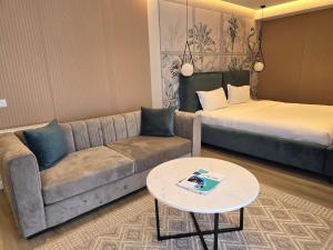Postel nebo postele na pokoji v ubytování Perla Hotel