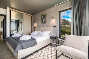 Postel nebo postele na pokoji v ubytování Villa Lapis Hvar