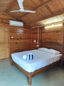 Postel nebo postele na pokoji v ubytování BR cottages