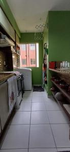 Kuhinja oz. manjša kuhinja v nastanitvi Apartamento Jasmim