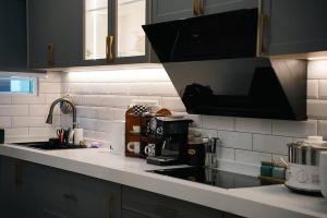 French Style Comfy Homestay Alor Setar 现代极简法式温馨民宿的厨房或小厨房