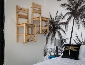 Ένα ή περισσότερα κρεβάτια σε δωμάτιο στο CASA PAXI CENTRO MERIDA ESTUDIO5