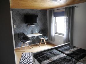 Postel nebo postele na pokoji v ubytování Eva's Home