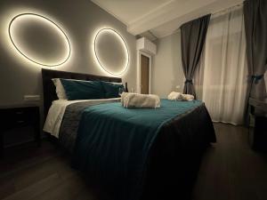 Postel nebo postele na pokoji v ubytování MEG Glamour Suite Milano vicino i Navigli