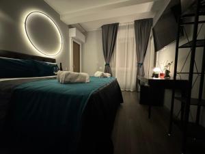 Postel nebo postele na pokoji v ubytování MEG Glamour Suite Milano vicino i Navigli