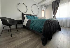Postel nebo postele na pokoji v ubytování MEG Glamour Suite Milano vicino i Navigli