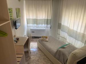 Ένα ή περισσότερα κρεβάτια σε δωμάτιο στο B&B Camera & Caffe