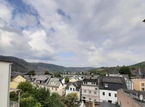 a view of a city with houses and mountains at Zum Jandel in Boppard