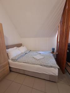 Postel nebo postele na pokoji v ubytování Sofi III