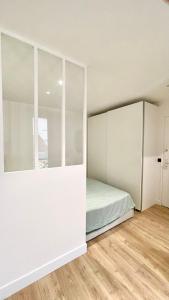 Dviaukštė lova arba lovos apgyvendinimo įstaigoje Appartement design central et au calme