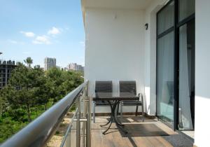 Апартаменты в Аркадии - Arcadia Sky Apartments的阳台或露台