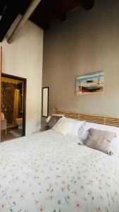 Postel nebo postele na pokoji v ubytování Kasa Kala Rooms & Apartments