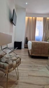 ローマにあるLivingvaticanoのリビングルーム(ベッド1台、椅子付)