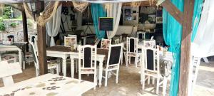 A restaurant or other place to eat at Orehite-Family Hotel ,Food & Pool
