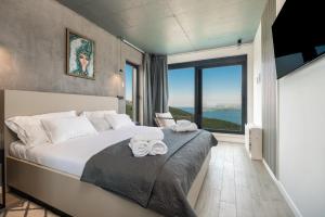 Postel nebo postele na pokoji v ubytování Villa Lapis Hvar