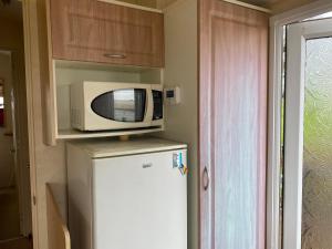 Kuchyň nebo kuchyňský kout v ubytování Caravan SK 110