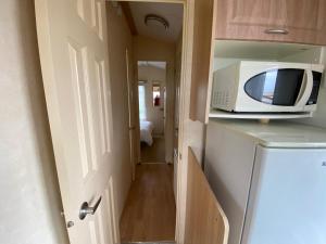 Kuchyň nebo kuchyňský kout v ubytování Caravan SK 110