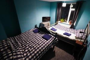 Ліжко або ліжка в номері 3 Bedroom home by Ipswich docks.