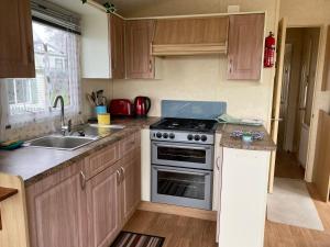 Kuchyň nebo kuchyňský kout v ubytování Caravan SK 110