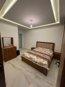 Postel nebo postele na pokoji v ubytování Appartement à Mehdia Beach
