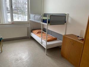 Ένα ή περισσότερα κρεβάτια σε δωμάτιο στο 3-Bett-Zimmer, für Monteure geeignet, Parkplatz
