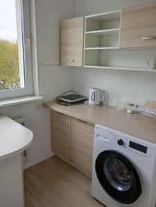 Kuchyň nebo kuchyňský kout v ubytování Apartament koło Zamku + 4 fotografie