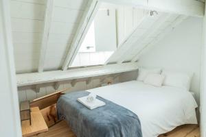 Katil atau katil-katil dalam bilik di Feelcoimbra Castelo Boutique APT - Duplex