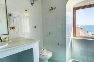 Kúpeľňa v ubytovaní S. Martin Hotel + 37 fotografií