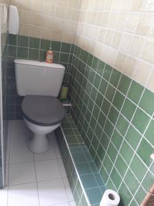 Koupelna v ubytování Chambre confortable en appartement partagé