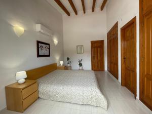 Posteľ alebo postele v izbe v ubytovaní Villa Casa Dalí