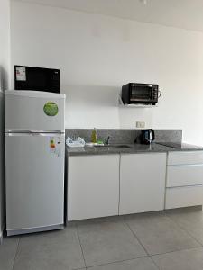 Kuchyň nebo kuchyňský kout v ubytování Departamento en corrientes 2