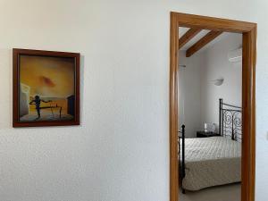 Posteľ alebo postele v izbe v ubytovaní Villa Casa Dalí