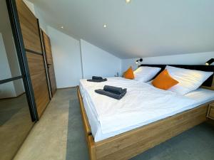 Postel nebo postele na pokoji v ubytování Ferienwohnung Eggstätt