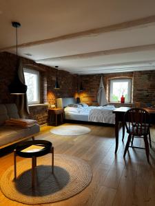 Postel nebo postele na pokoji v ubytování Dom Cukiernika