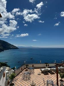 a view of the ocean from a hotel balcony at YourHome - Adoro Positano in Positano