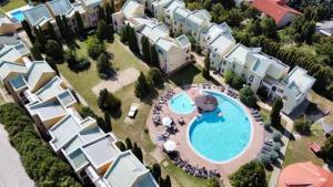 The swimming pool at or close to Helena Stúdió Apartman