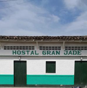 a building with a sign that reads hospital gram jade at Hostal Gran Jade in Moyogalpa