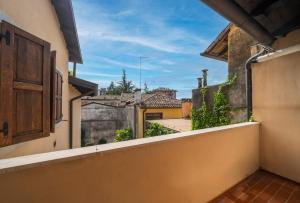 a view from the balcony of a house at Le Mandarine Apartments - Superior Apartment in Udine