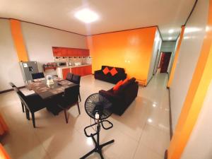 an aerial view of a living room and dining room at 300 RV Apartments Iquitos Peru-Apartamento tercer piso con 1 dormitorio in Iquitos +2 photos