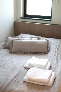 En eller flere senge i et værelse på Belgrade Waterfront- Libera