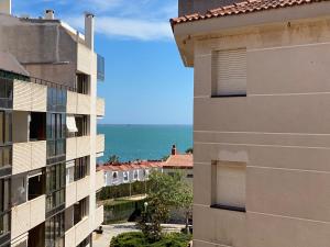 a view of the ocean from a building at Apartamento vistas al mar, segunda línea 3 habitaciones in Sant Carles de la Ràpita