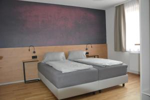 Postel nebo postele na pokoji v ubytování Pletz