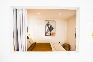 Voodi või voodid majutusasutuse Condo Enjoy toas