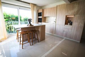 Kuchyň nebo kuchyňský kout v ubytování Condo Enjoy + 10 fotografií